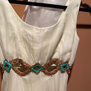 Long creamy beautiful dress.